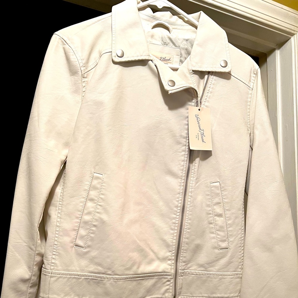 NWT!! Trendy faux white leather jacket.  Zipper on sleeves.  Size Medium
